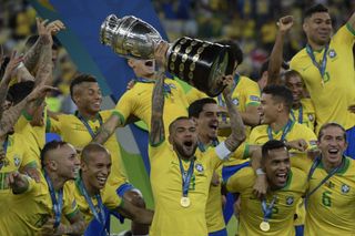 Dani Alves and his Brazil team-mates celebrate their Copa America win in 2019.