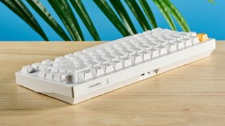 A white Lemokey P1 HE magnetic keyboard