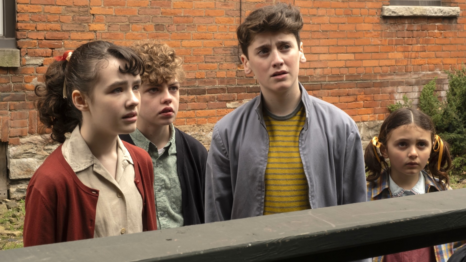 (L-R) Clara Stack, Mikkal Karim-Fidler, Jack Molloy Legault and Matilda Legault in "IT: Welcome to Derry."