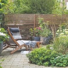 summer garden with sun lounger
