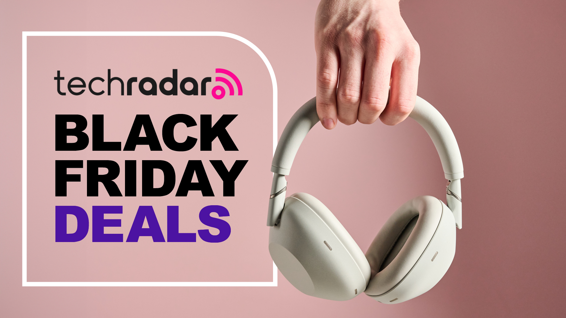 Sony WH-1000XM6 headphones held in a man&#039;s hand, with a sign saying: Black Friday Deals