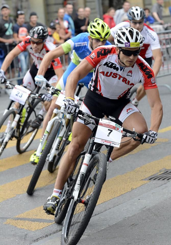Daniel Federspiel (Austria) leads around a curve