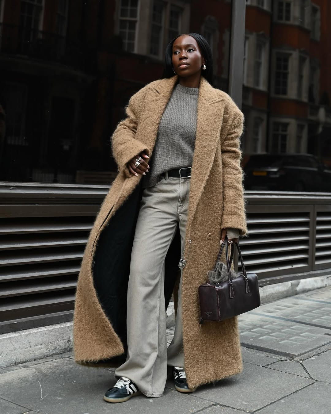 Danielle wearing beige jeans