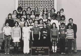Slash (third row, second from left) in his 6th grade class photo from Third Street School, Los Angeles in 1977