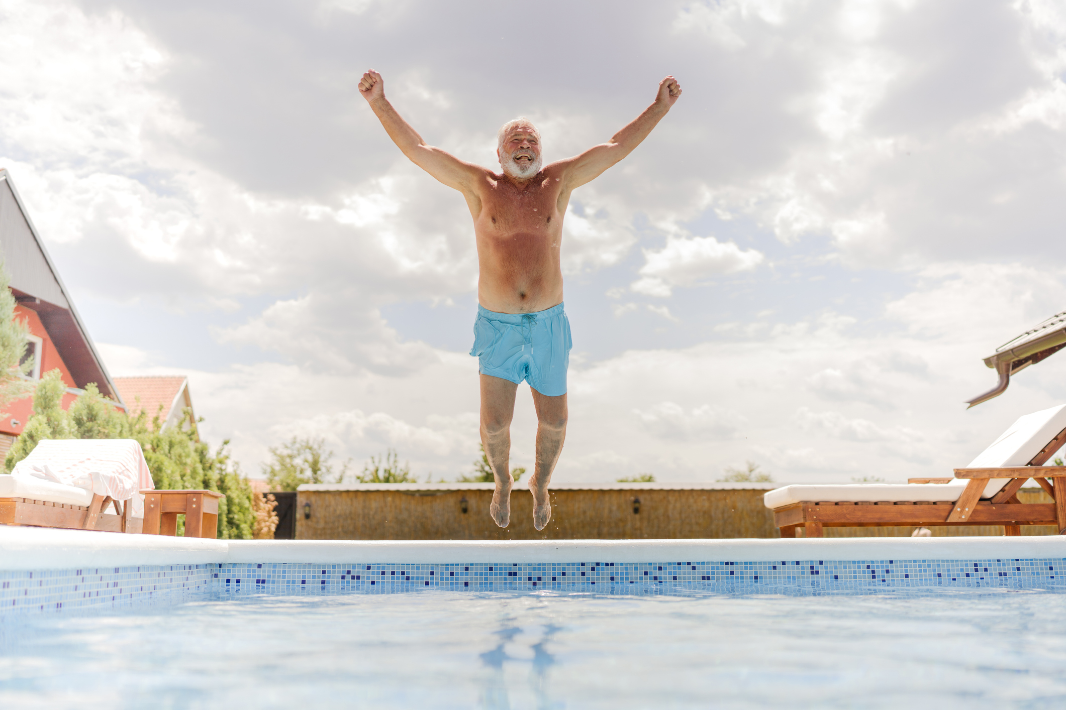 Man jumping in the pool