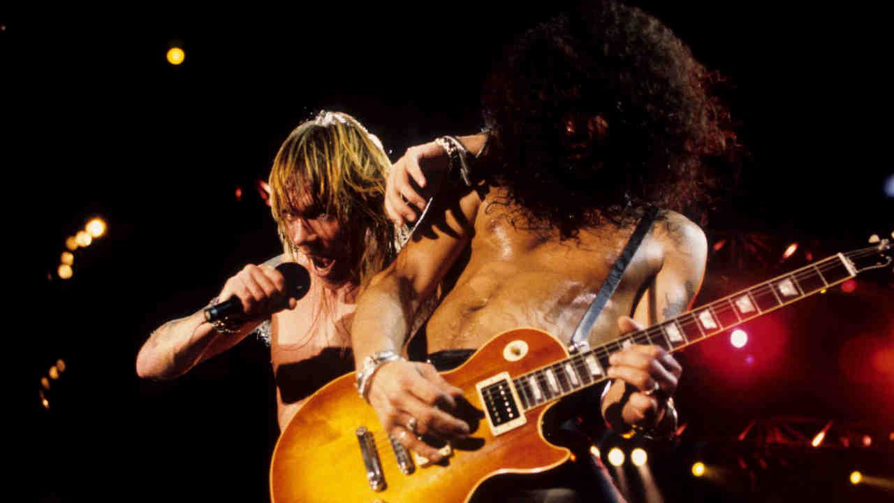 Axl Rose and Slash of Guns N’ Roses performing onstage in 1991