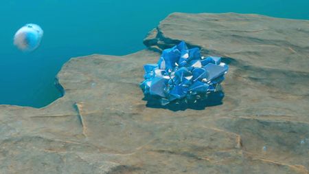 A Celestine deposit sits on a rock shelf in Subnautica 2