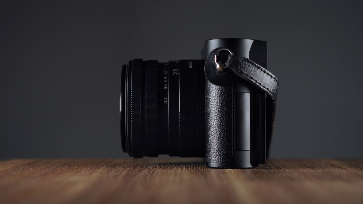 Leica Q3 Monochrom on a wooden surface