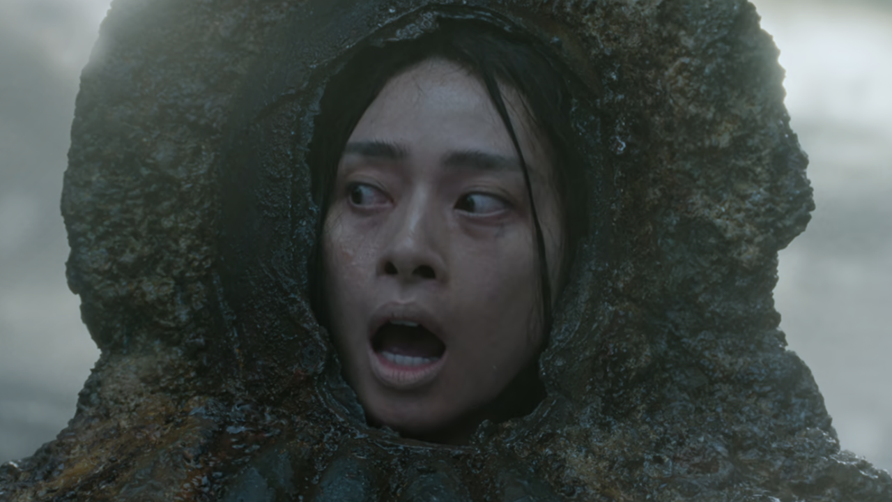 Veronica Ngo being let out of underwater casket in The Old Guard 2