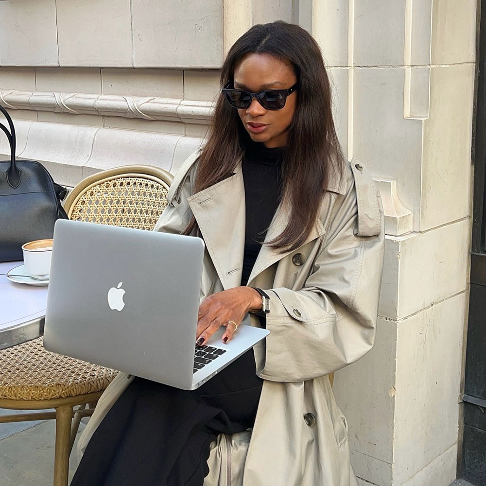 A fashion person in a trench coat 