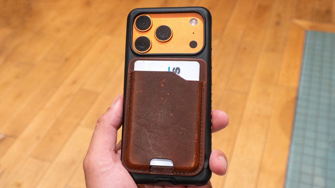 Nomad Leather Mag Wallet on iPhone 17 Pro case.