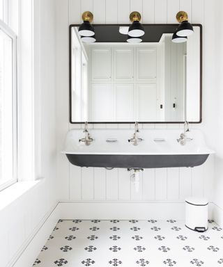 White and black tiled floor and sink