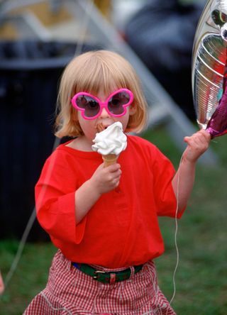 Princess Beatrice eating ice cream as a child