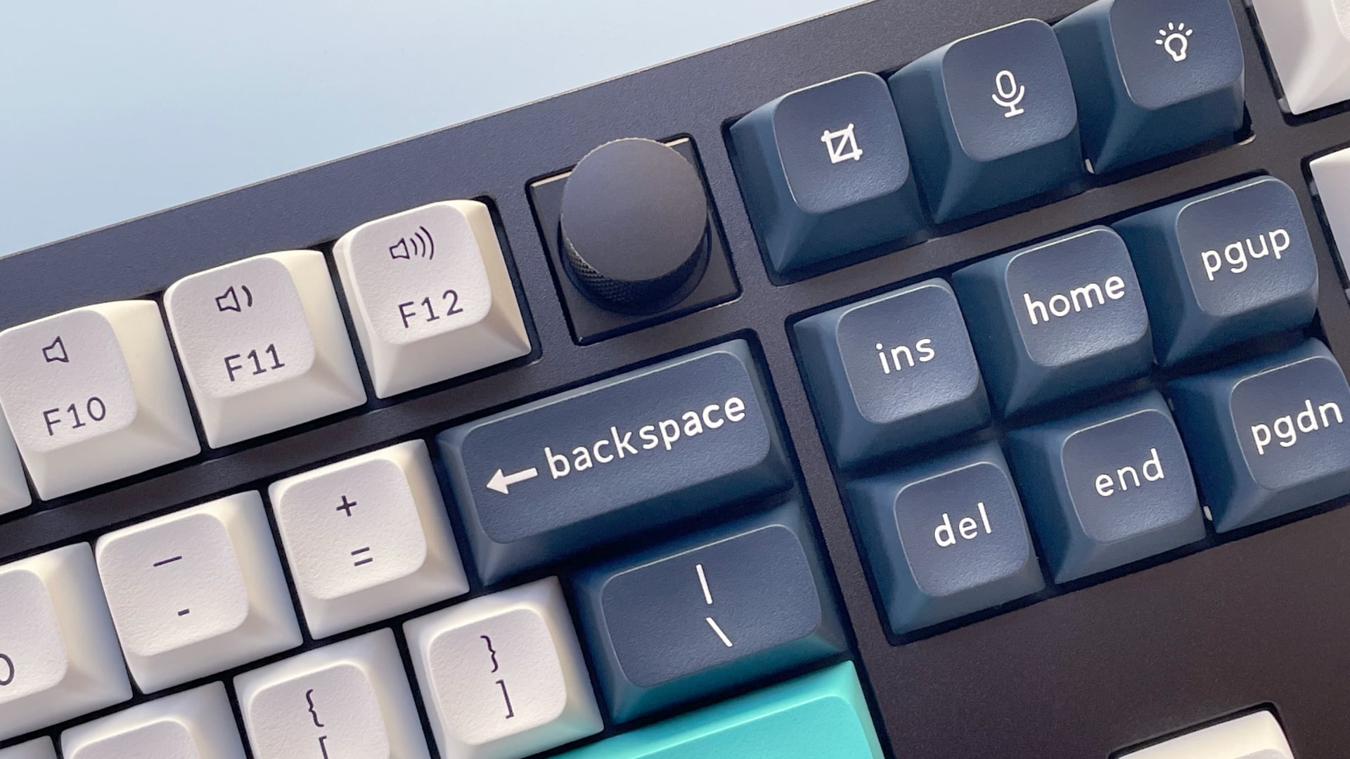 The Keychron Q6 Max mechanical keyboard against a blue background.