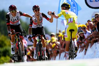 PLANCHE DES BELLES FILLES FRANCE JULY 08 LR Brandon Mcnulty of United States George Bennett of New Zealand and Tadej Pogacar of Slovenia and UAE Team Emirates Yellow Leader Jersey celebrates at finish line during the 109th Tour de France 2022 Stage 7 a 1763km stage from Tomblaine to La Super Planche des Belles Filles 1141m TDF2022 WorldTour on July 08 2022 in Planche des Belles Filles France Photo by Tim de WaeleGetty Images