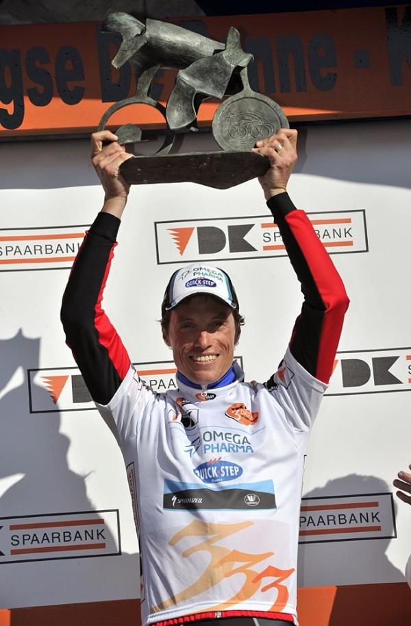 Sylvain Chavanel (Omega Pharma-Quickstep) hoists the trophy for his win in De Panne