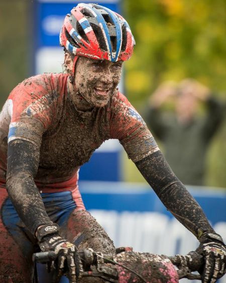 Gunn-Rita Dahle Flesjaa (Norway) finishes up a muddy day in the saddle