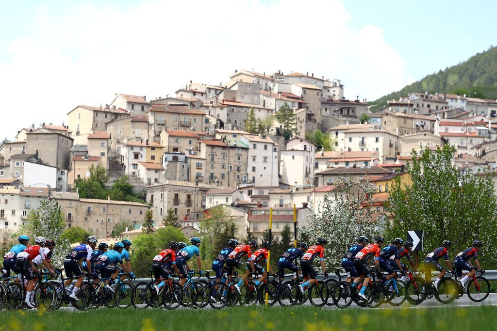 BLOCKHAUS ITALY MAY 15 A general view of the peloton passing through Gamberale village 1235m landscape during the 105th Giro dItalia 2022 Stage 9 a 191km stage from Isernia to Blockhaus 1664m Giro WorldTour on May 15 2022 in Blockhaus Italy Photo by Michael SteeleGetty Images