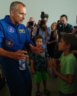 Canadian astronaut David Saint-Jacques greets well-wishers at the Montreal Science Centre on July 20, 2018.