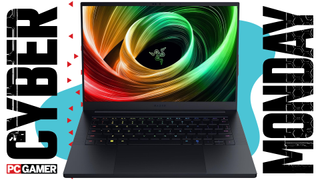 A Razer laptop on a blue Cyber Monday background.