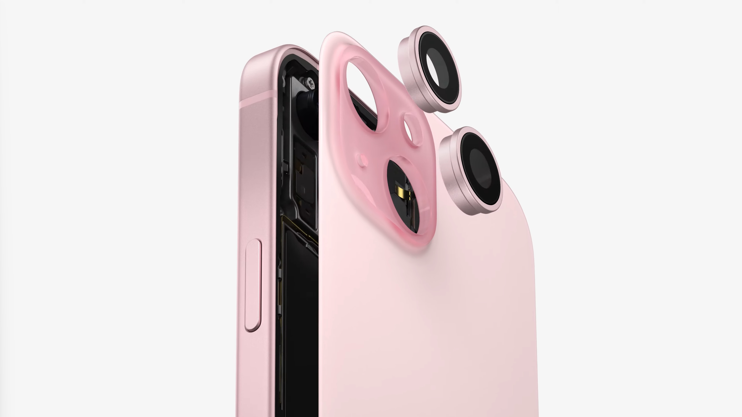 The pink Apple iPhone 15 with its camera lenses exploding off in a controlled way