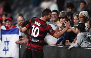 Tomer Hemed interacts with fans after an A-League match between Western Sydney Wanderers and Adelaide United in March 2022.
