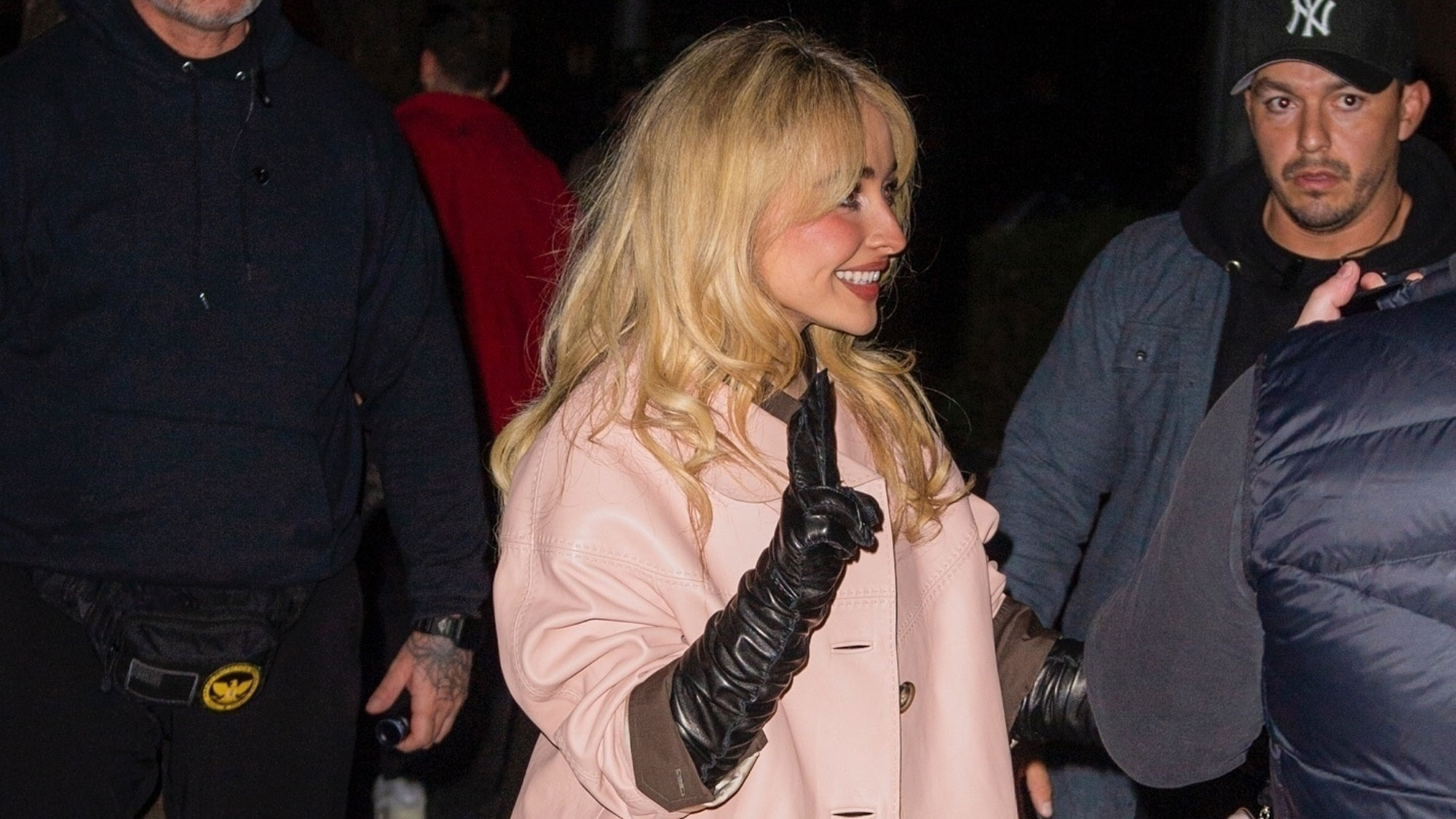 Sabrina Carpenter wore a Prada spring 2026 runway look in NYC, including a pink coat and satin underwear