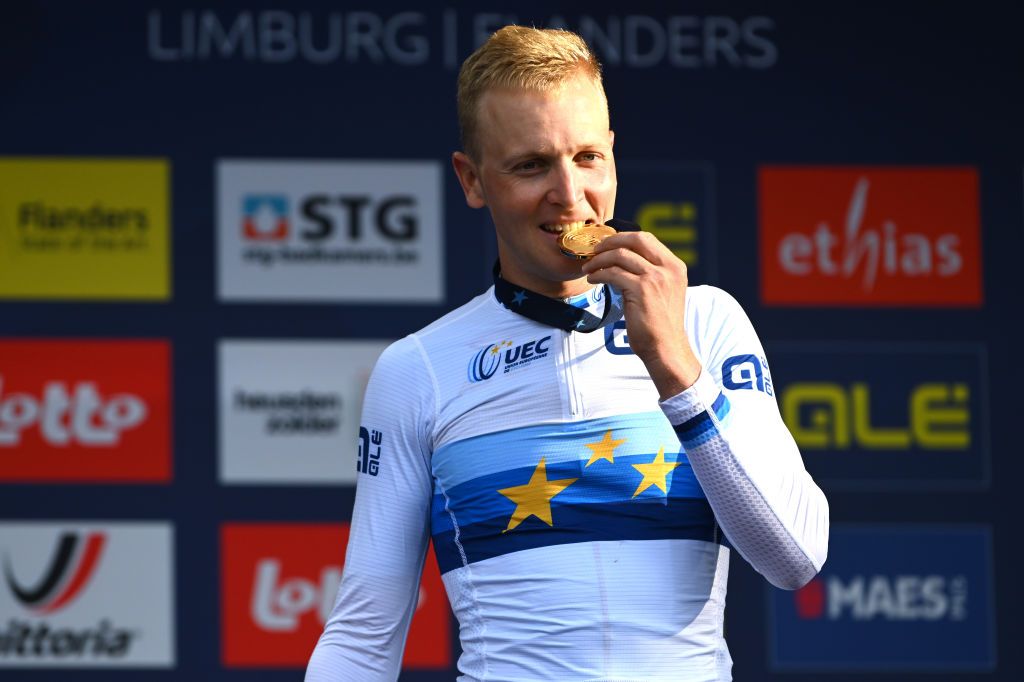 HASSELT BELGIUM SEPTEMBER 15 Gold medalist Tim Merlier of Team Belgium celebrates winning during the medal ceremony after the 30th UEC Road Cycling European Championships 2024 Mens Elite Road Race a 2228km one day race from HeusdenZolder to Hasselt on September 15 2024 in Hasselt Belgium Photo by Luc ClaessenGetty Images