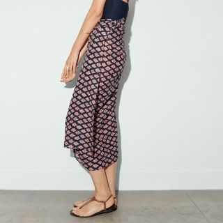 Cropped image of woman in printed skirt