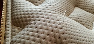 Loom and leaf mattress review closeup loose thread