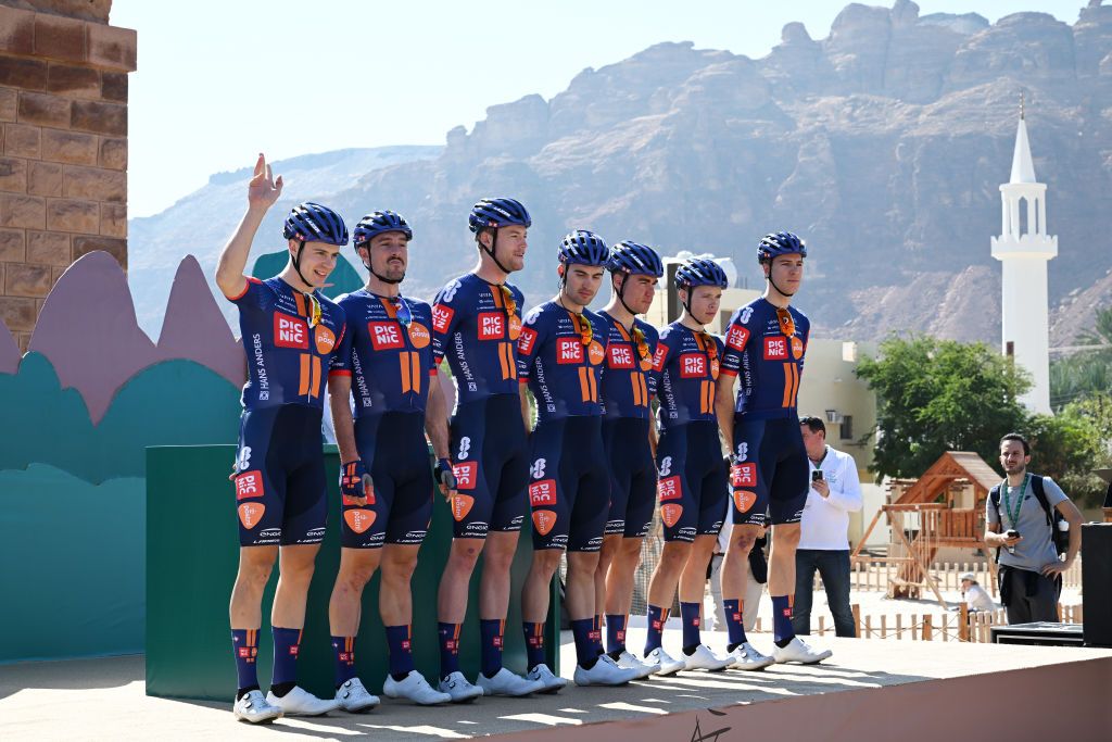 AL MANSHIYAH SAUDI ARABIA JANUARY 28 A general view of Fabio Jakobsen of The Netherlands John Degenkolb of Germany Nils Eekhoff of The Netherlands Enzo Leijnse of The Netherlands Niklas Markl of Germany Frank Van Den Broek of The Netherlands Casper Van Uden of The Netherlands and Team Picnic PostNL prior to the 5th AlUla Tour 2025 Stage 1 a 1427 km stage from Al Manshiyah Train Station to Al Manshiyah Train Station on January 28 2025 in Al Manshiyah Saudi Arabia Photo by Szymon GruchalskiGetty Images