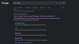 A screenshot of Google Search in Chrome on a Windows laptop in dark mode. The background color is now true black instead of grey like before. The search results are for "Tom's Guide".