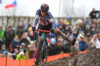 Katie Compton gets loose in the mud at the 2018 World Championships in Valkenburg