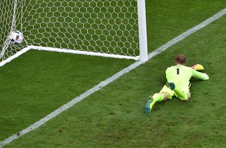 England's goalkeeper Joe Hart fails to save the ball during the Euro 2016 group B football match between England and Wales at the Bollaert-Delelis stadium in Lens on June 16, 2016.