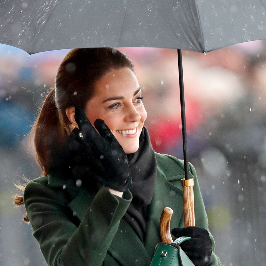 Princess Kate on a rainy day with an umbrella