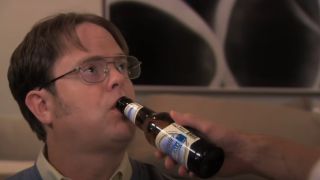 Dwight forces Jim to feed him beer