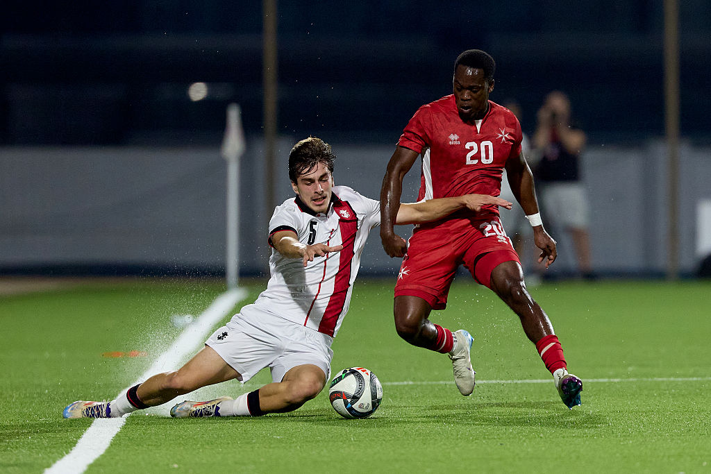 Saba Kharebashvili of Georgia plays against Basil Tuma of Malta during the UEFA European Under-21 Championship 2027 Qualifying round soccer match between Malta and Georgia at the Centenary Stadium in Ta' Qali, Malta, on October 14, 2025.