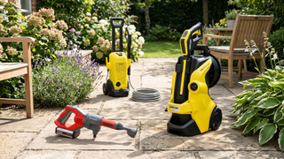 Three of the best pressure washers on a patio in a garden