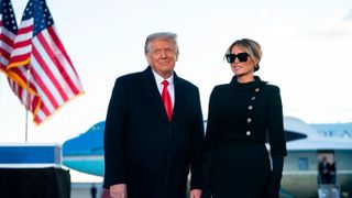 Outgoing US President Donald Trump and First Lady Melania Trump address guests at Joint Base Andrews in Maryland on January 20, 2021
