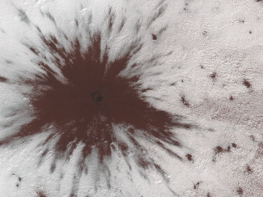 A large object such as a meteoroid hit near Mars&#039; southern ice cap, puncturing the ice and creating a splat.