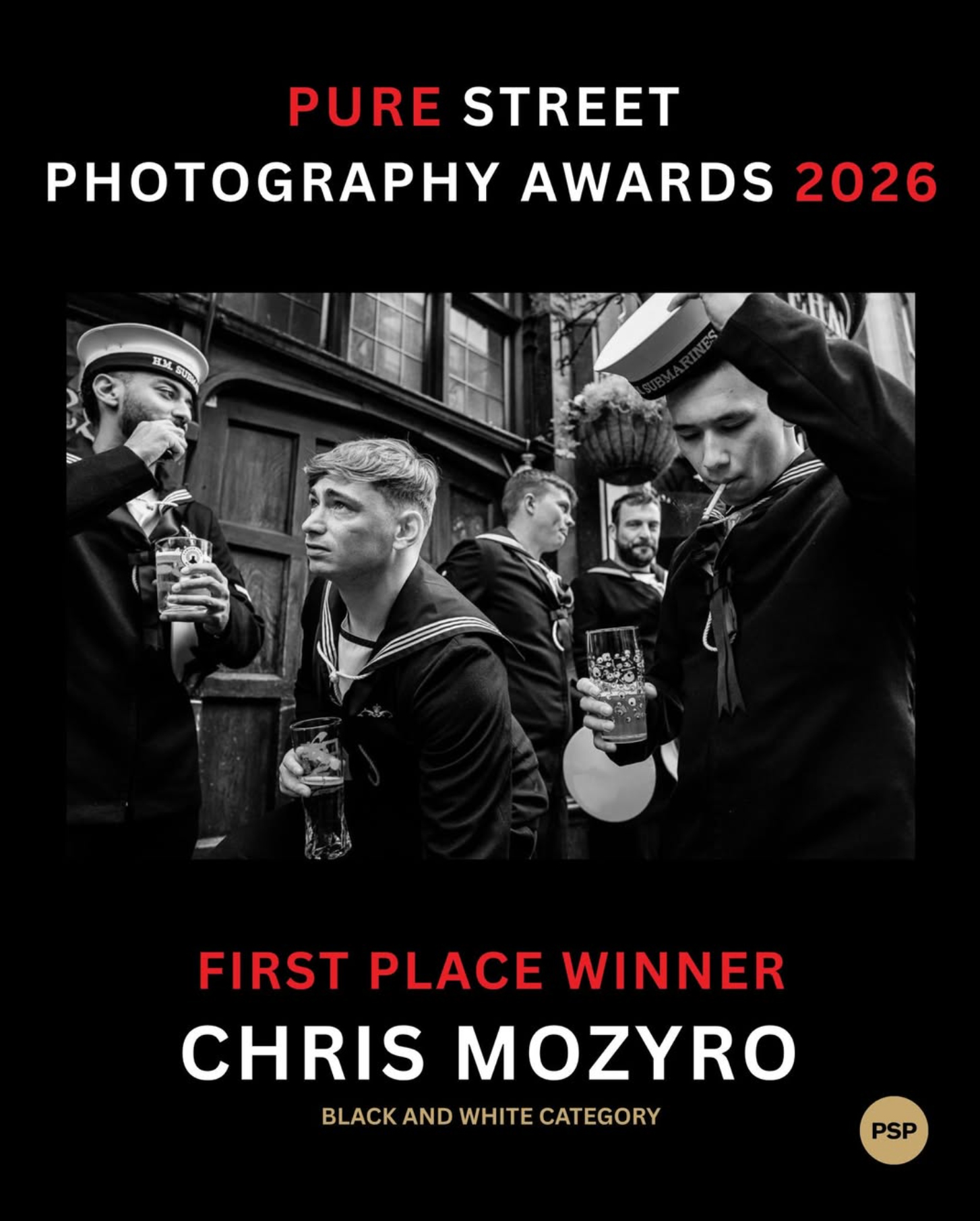 Black and white photo of five sailors in uniform holding drinks, celebrating outdoors; wins Pure Street Photography Awards 2026 first place, Chris Mozyro