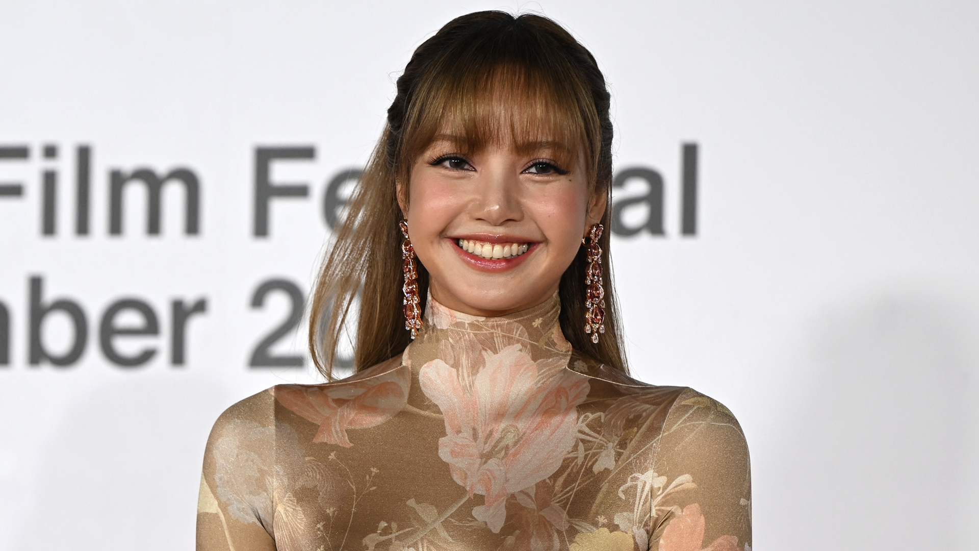 Lisa of Blackpink attended a Korean film festival in a corseted Maison Margiela gown