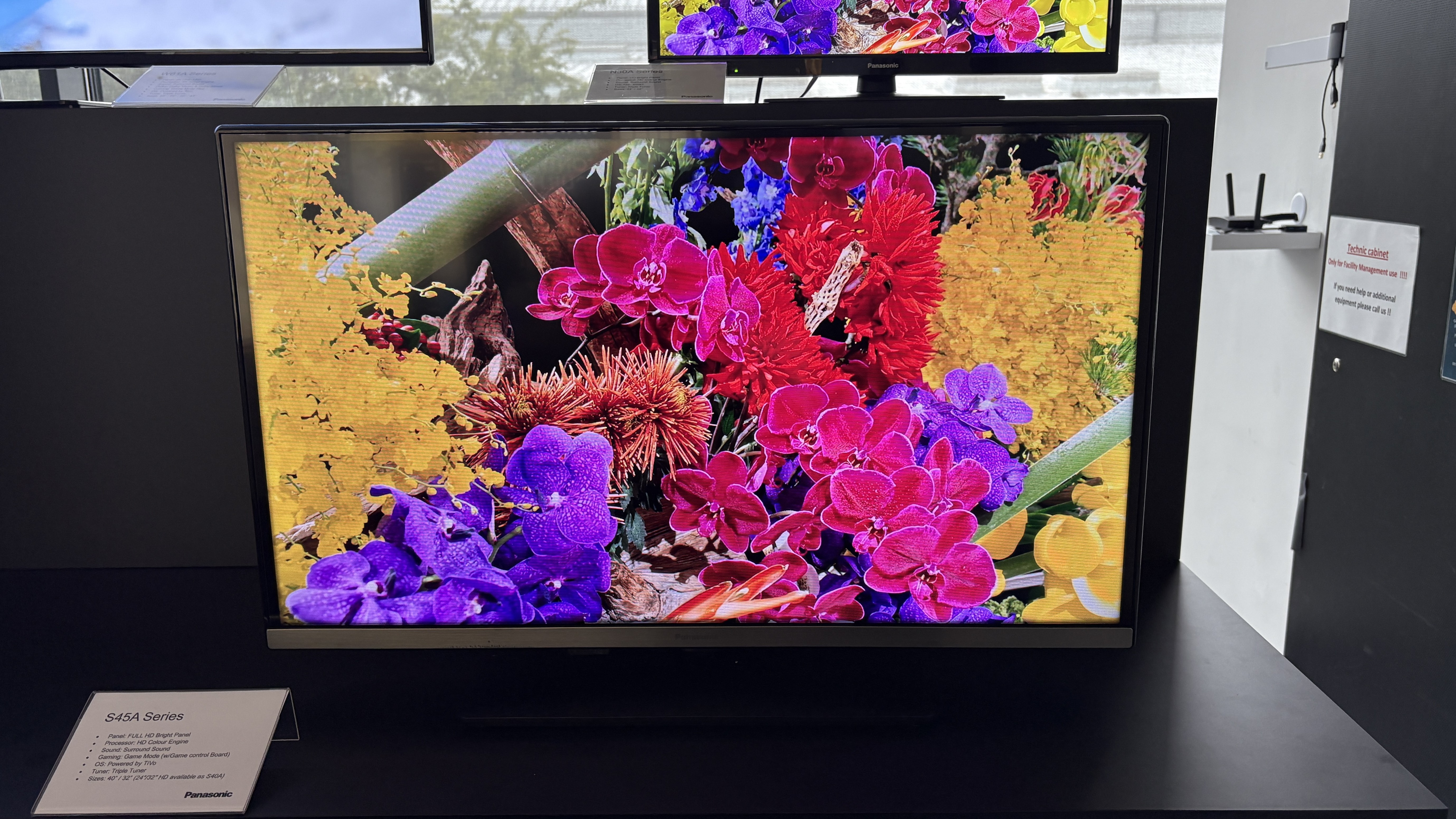 Panasonic TVs on a black show stand