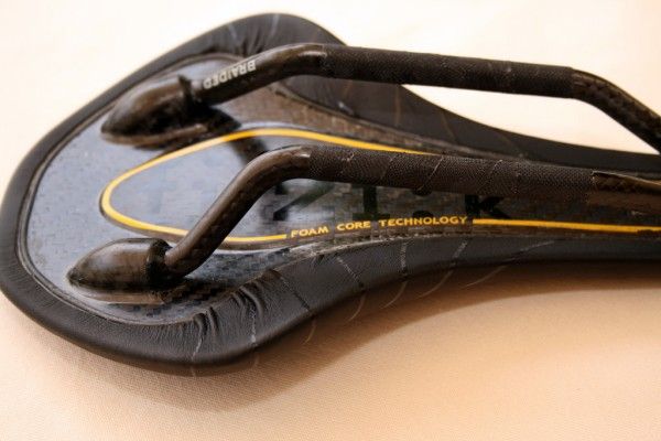 Braided carbon rails protected by fi'zi:k&rsquo;s trademark wrap.
