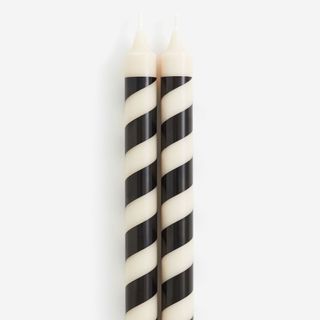 White and black candy-striped candlesticks
