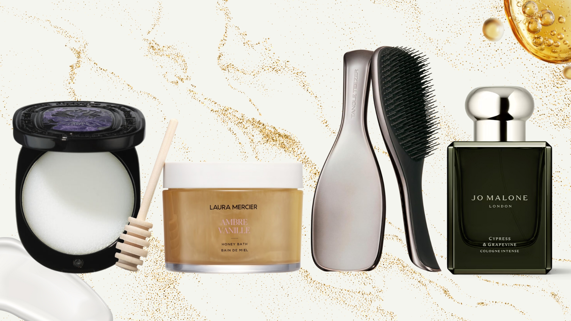 Collage of last minute beauty gifts, including a Diptyque solid perfume, Laura Mercier's Honey Bath, silver Tangle Teezer hairbrush and Jo Malone perfume, on a white and gold speckled background, with cream and oil swatches