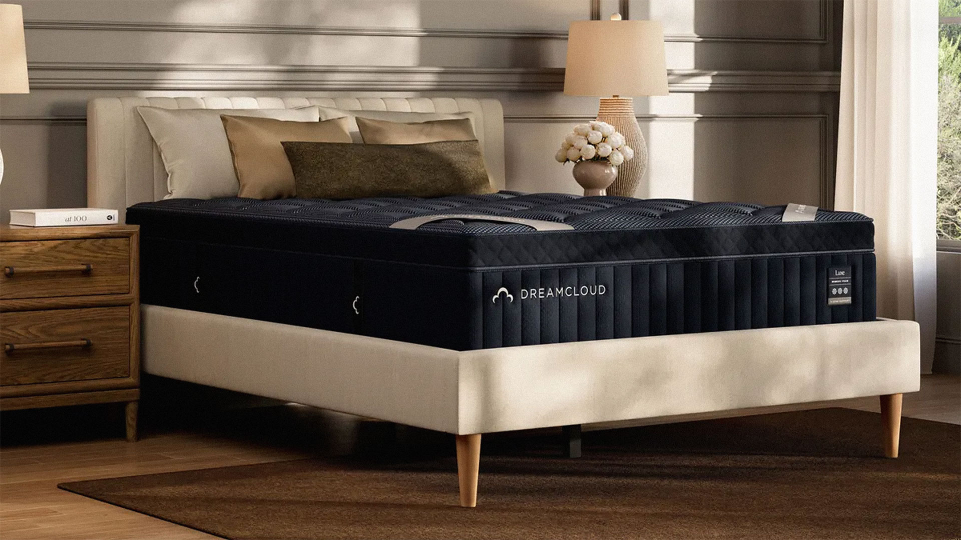 The DreamCloud Luxe Memory Foam mattress in a bedroom
