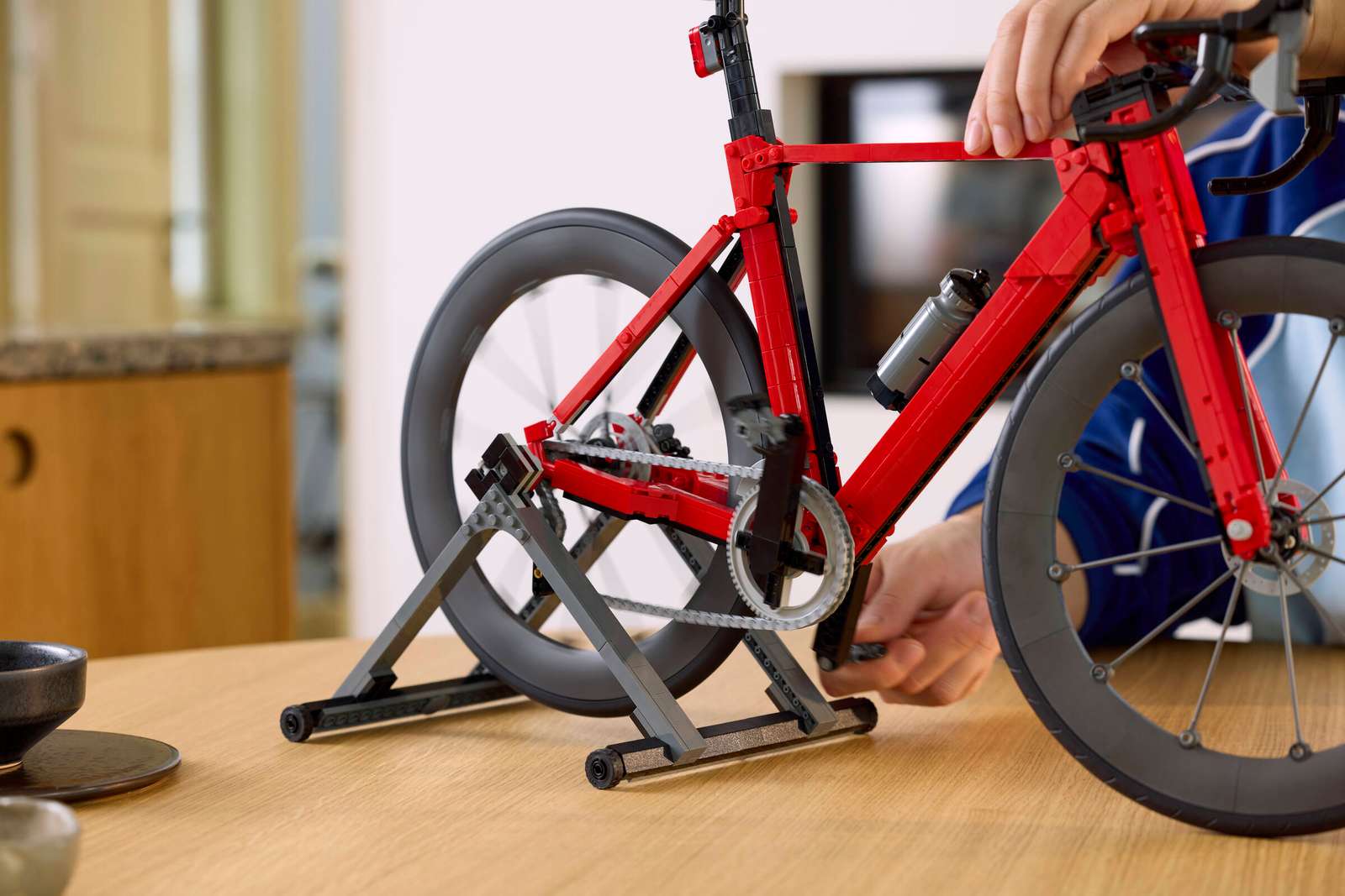 Close up details of the Lego Icons Road Bike showing the functioning drivetrain 