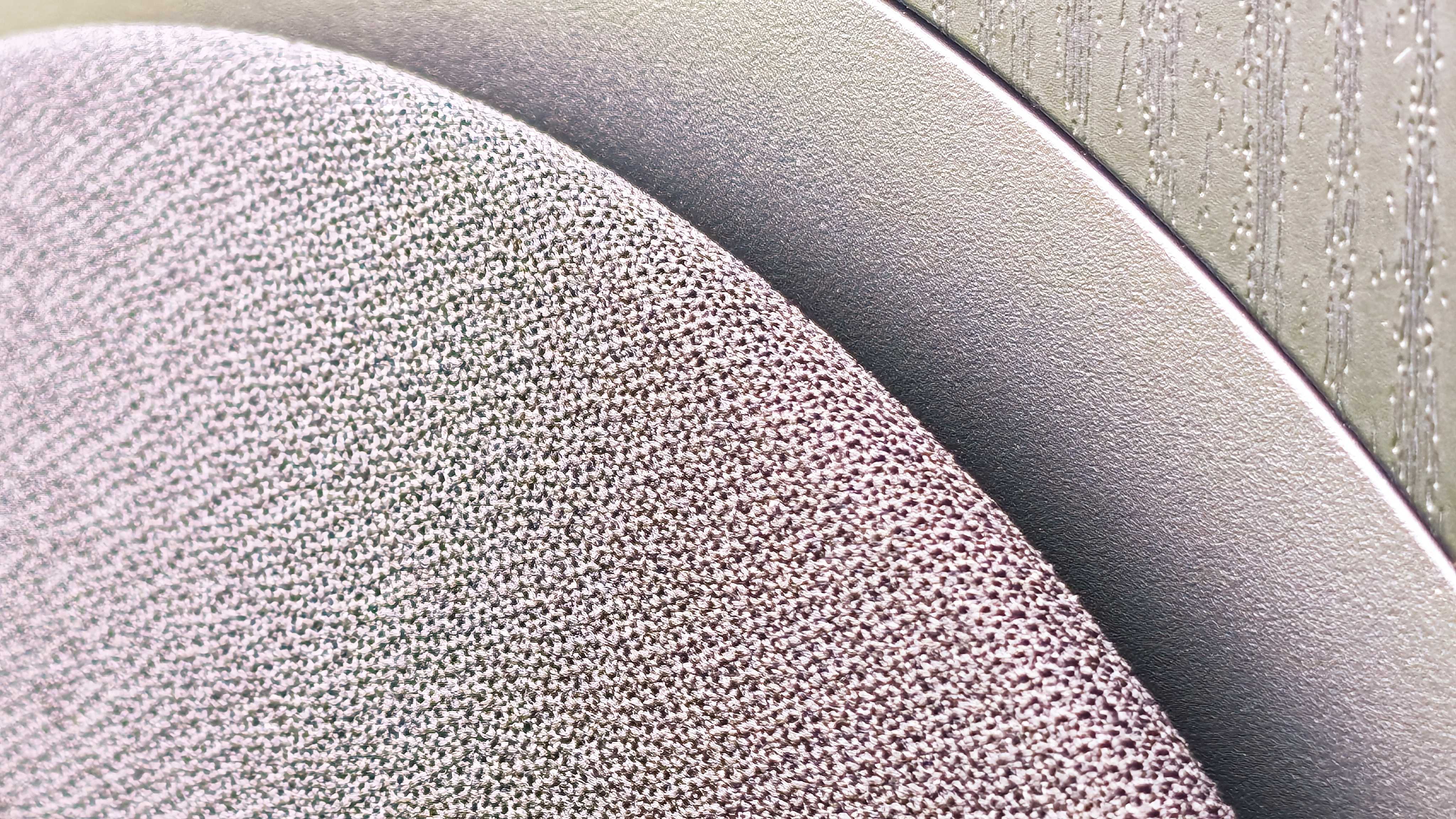 Edifier T5s subwoofer on a green garden lawn
