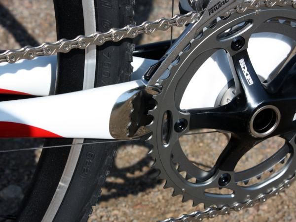 A metal plate protects the carbon chainstay from chain suck